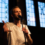 Jacob Adriani on stage (Comedy Spotlight)