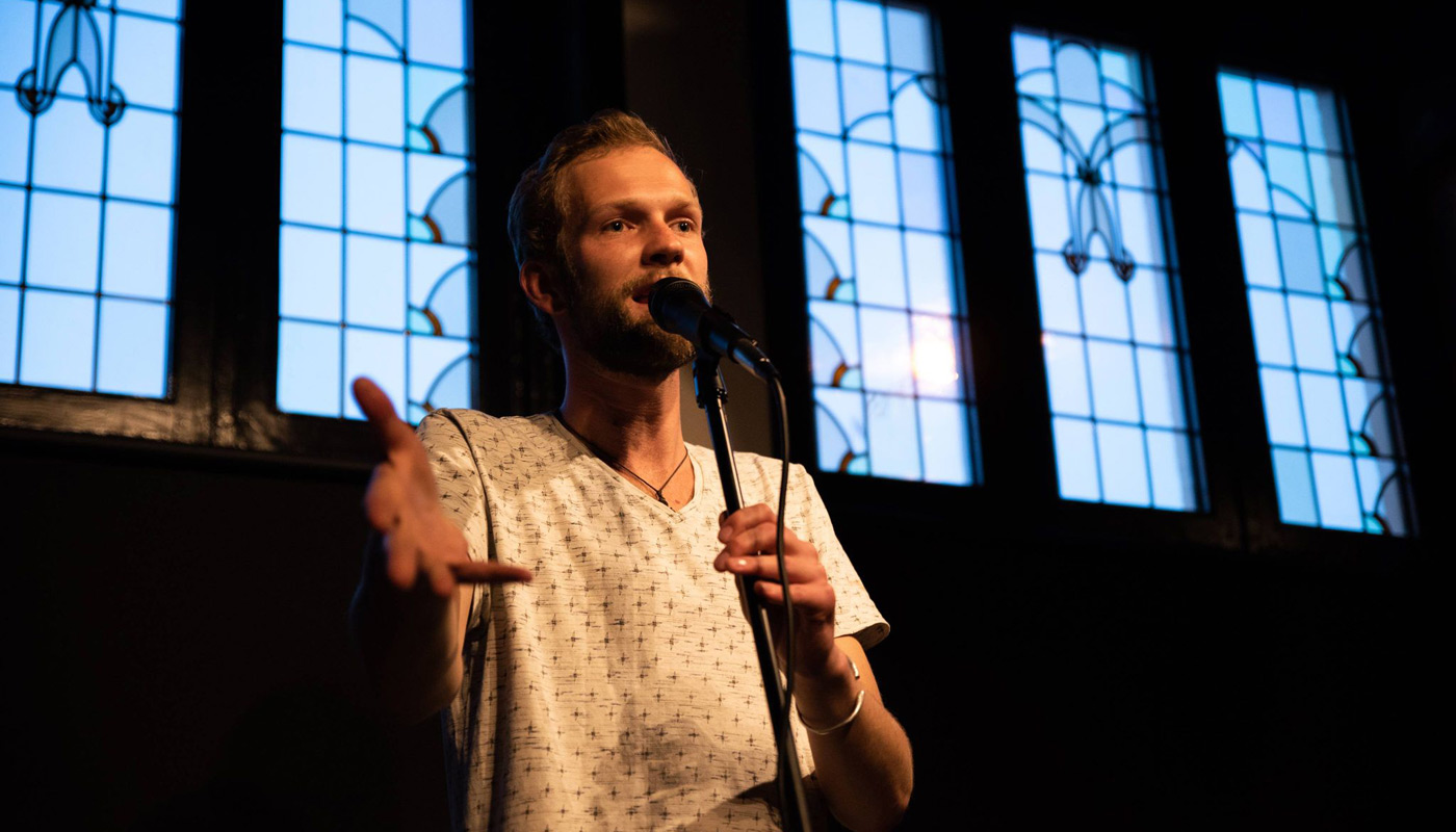 Jacob Adriani on stage (Comedy Spotlight)